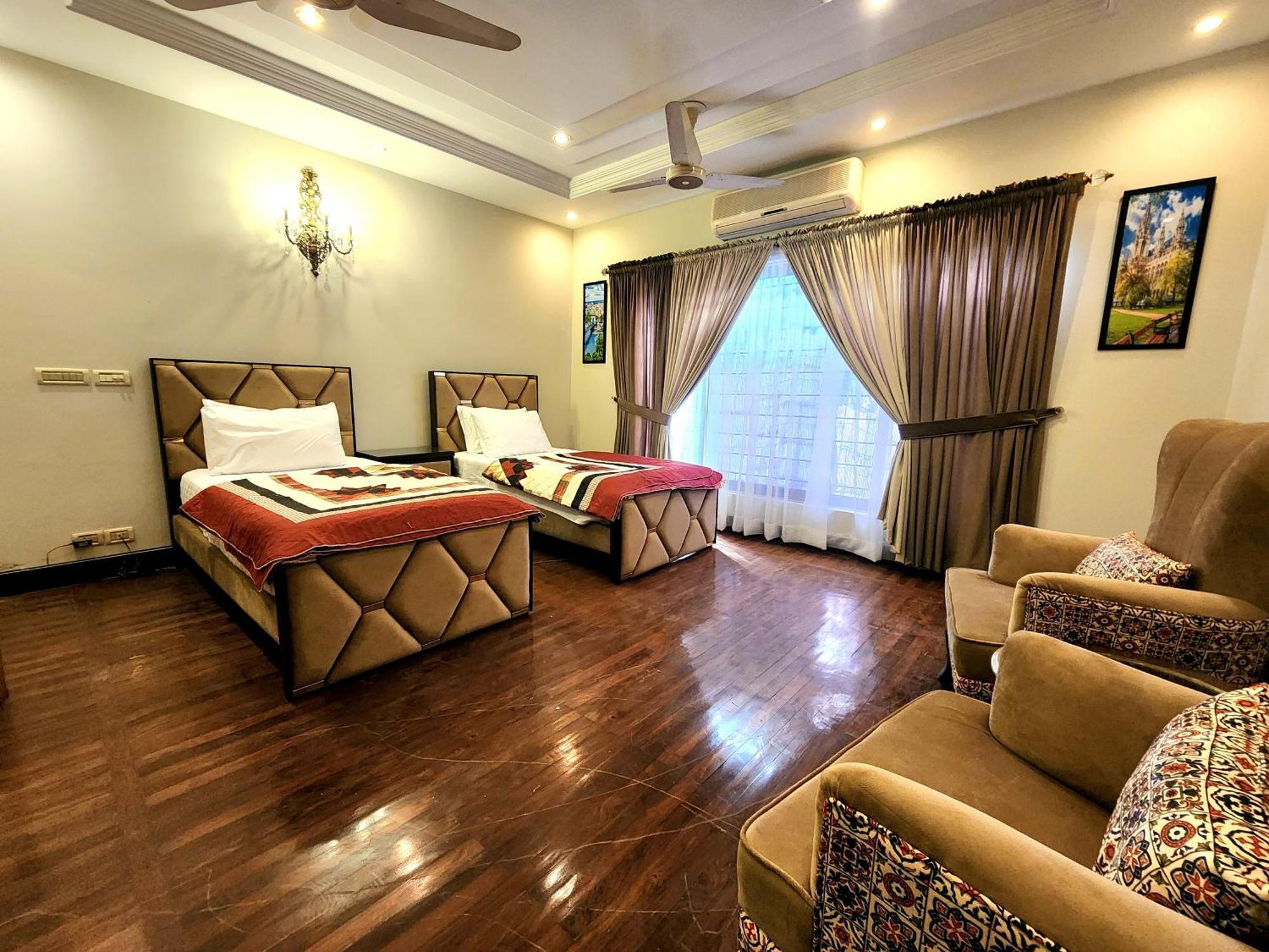 Luxurious Landing Apartments & Suites Bahria Town Rawalpindi Quarto foto