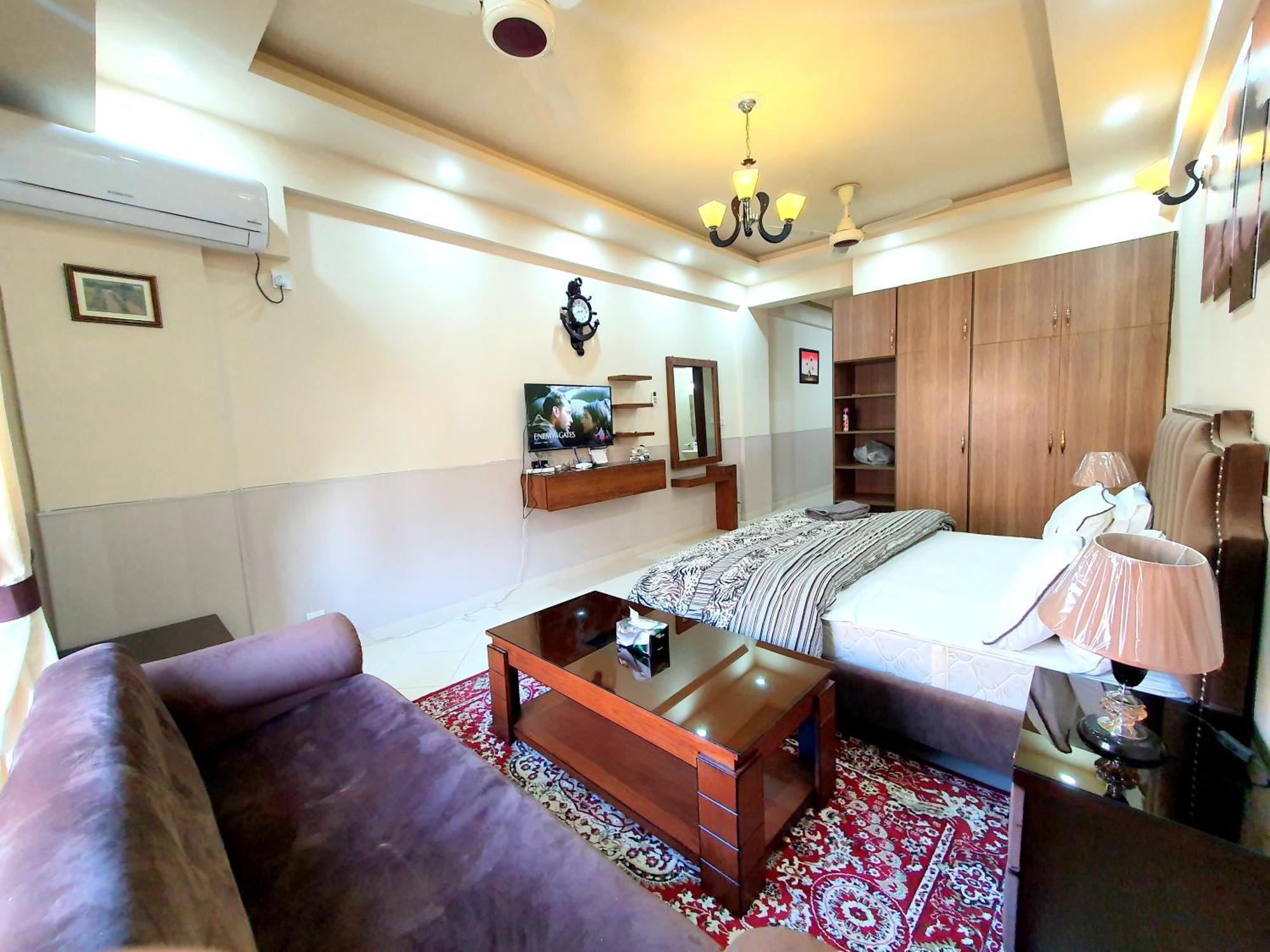 Luxurious Landing Apartments & Suites Bahria Town Rawalpindi Quarto foto