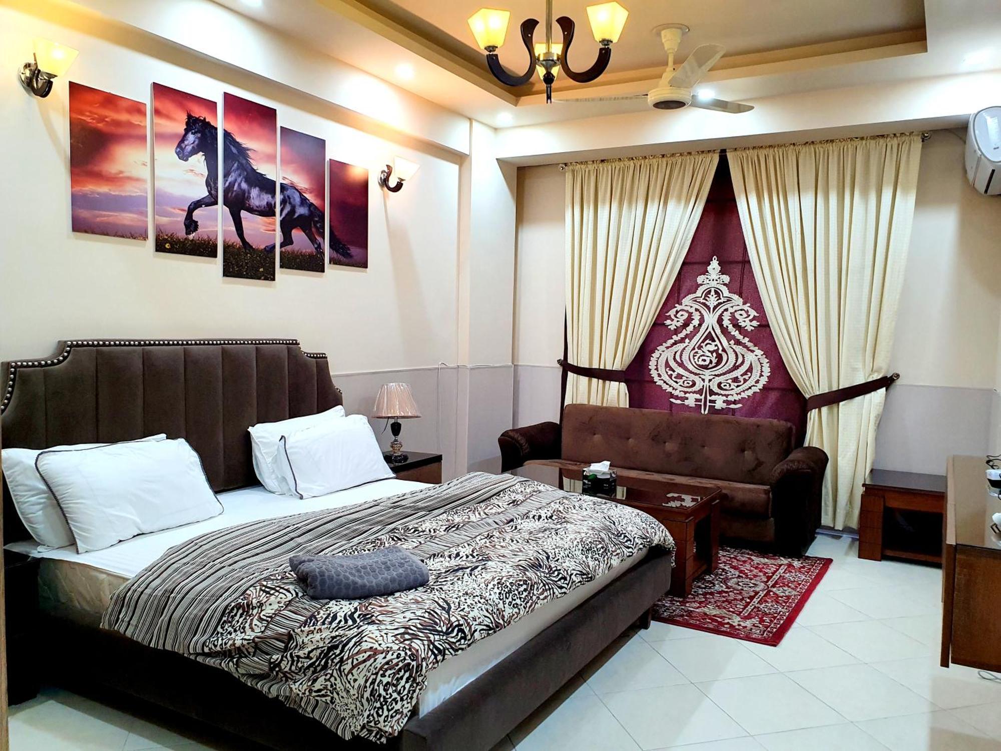 Luxurious Landing Apartments & Suites Bahria Town Rawalpindi Quarto foto